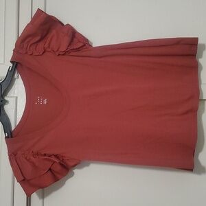 A short sleeve top with ruffles